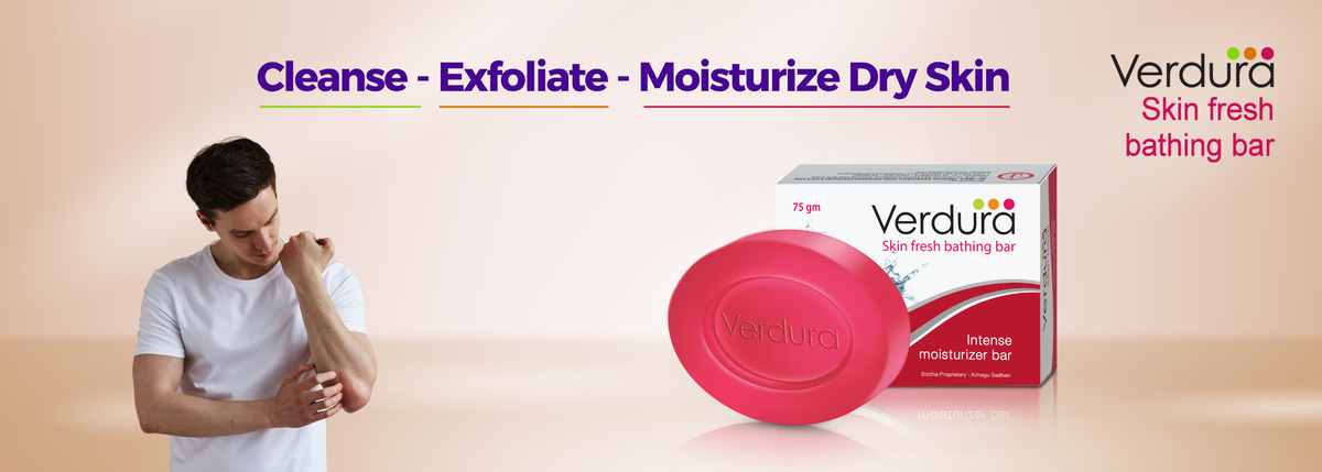 A promotional banner for Verdura Skin Fresh Bathing Bar. On the left, a man in a white t-shirt rubs his arm, demonstrating dry skin.